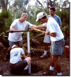 EAS 4420 participants install well casing (Dr. Carolyn Ruppel)